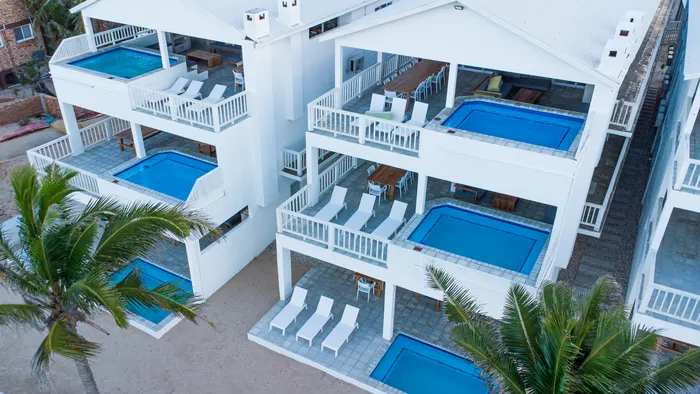 Aerial perspective of the beach houses at Barra Cabanas, Inhambane province
