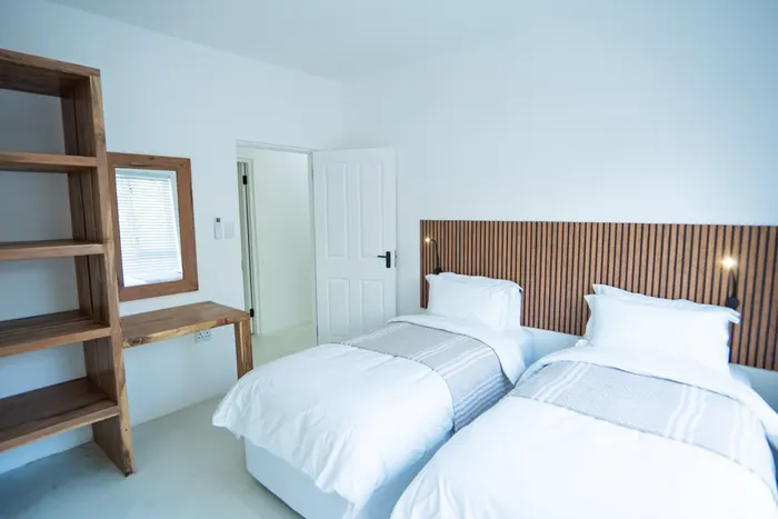 Guest bedroom inside a Barra Cabanas beachfront holiday house