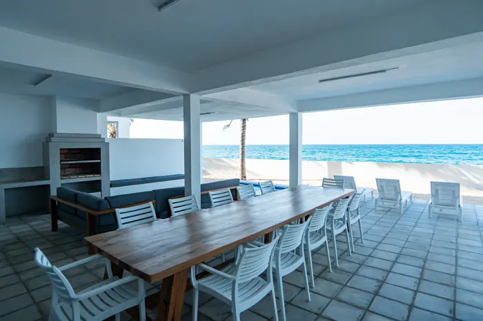 Outdoor entertainment space at the Barra Cabanas beach houses